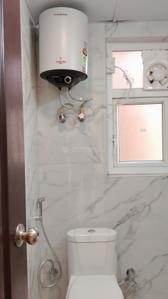 Bathroom Image of 550 Sq.ft 1 BHK Apartment / Flat for rent in Aditya Urban Royale, Bamheta Village Ghaziabad for Rs. 20000