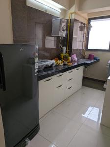 Kitchen Image of 730 Sq.ft 1 BHK Apartment / Flat for rent in Zaveri Palash Homes, Sarkhej Ahmedabad for Rs. 25000