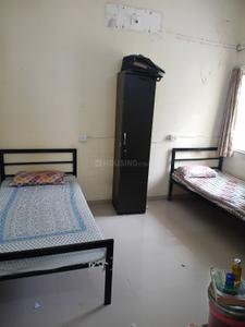 Bedroom Image of NAVYA PG SERVICE in Satellite, Ahmedabad