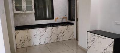 Kitchen Image of 810 Sq.ft 2 BHK Apartment / Flat for rent in Anikedhya Atlantis, Chandkheda Ahmedabad for Rs. 22000