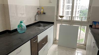 Kitchen Image of 900 Sq.ft 2 BHK Apartment / Flat for rent in Vijay Orovia, Hiranandani Estate Thane for Rs. 35000