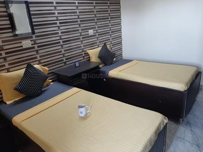 Bedroom Image of EVERGREEN HOME PG in Ramesh Nagar, New Delhi