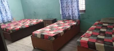 Bedroom Image of Dharam Girls  PG  in Phase 2, Noida