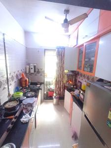 Kitchen Image of 672 Sq.ft 1 BHK Apartment / Flat for sale in Shree Chamunda Garden, Thakurli Thane for Rs. 4600000