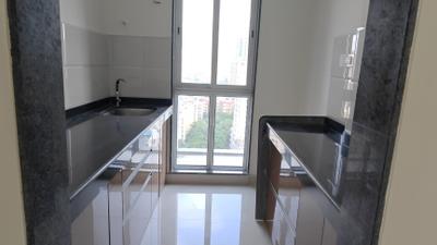 Kitchen Image of 550 Sq.ft 1 BHK Apartment / Flat for rent in Larkins Nest, Kasarvadavali Thane for Rs. 18000
