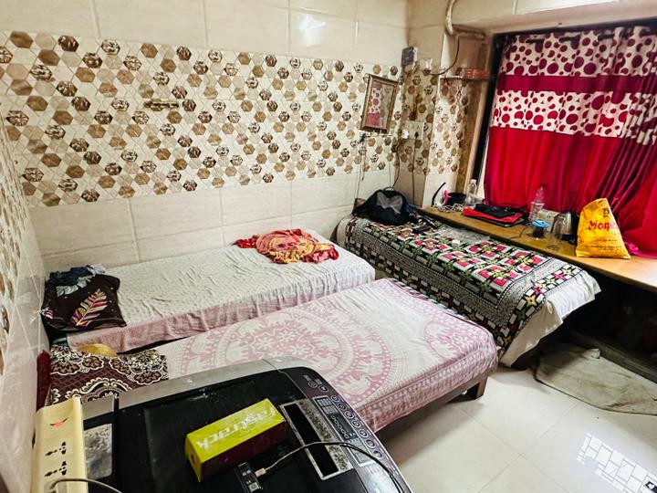 Bedroom Image of naseem pg in Malad West, Mumbai