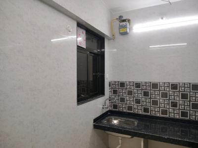 Kitchen Image of 700 Sq.ft 1 BHK Apartment / Flat for rent in Raunak Delight, Kasarvadavali Thane for Rs. 15500