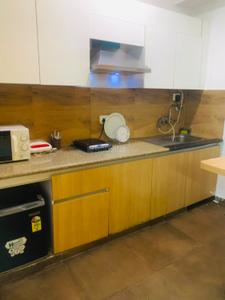 Kitchen Image of 506 Sq.ft 1 RK Apartment / Flat for sale in Nimbus The Golden Palms, Sector 168 Noida for Rs. 6600000