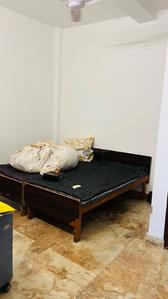 Bedroom Image of 450 Sq.ft 1 BHK Builder Floor for rent in Kotla Mubarakpur New Delhi for Rs. 20500