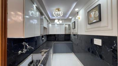 Kitchen Image of 810 Sq.ft 3 BHK Apartment / Flat for sale in Dwarka Mor New Delhi for Rs. 7000000