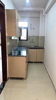 Kitchen Image of 675 Sq.ft 2 BHK Apartment / Flat for sale in Chhattarpur New Delhi for Rs. 3600000