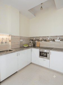 Kitchen Image of 950 Sq.ft 2 BHK Apartment / Flat for sale in Noida Extension Greater Noida for Rs. 3500000