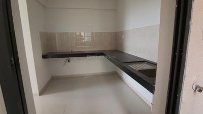 Kitchen Image of 1069 Sq.ft 2 BHK Apartment / Flat for sale in Shapoorji Pallonji Joyville Sensorium, Maan Pune for Rs. 11500000