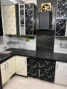 Kitchen Image of 900 Sq.ft 3 BHK Builder Floor for rent in Sector 3 Rohini New Delhi for Rs. 38000