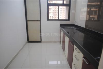 Kitchen Image of 663 Sq.ft 1 BHK Apartment / Flat for sale in Cosmos Meluha, Khidkali Thane for Rs. 4350000