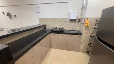 Kitchen Image of 705 Sq.ft 1 BHK Apartment / Flat for sale in Lodha Belmondo, Gahunje Pune for Rs. 7700000
