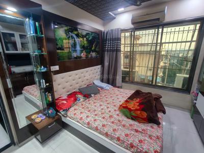 Bedroom Image of 800 Sq.ft 2 BHK Apartment / Flat for rent in Arihant Mahavir Vaibhav, Kopar Khairane Navi Mumbai for Rs. 52000