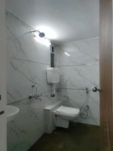Common Bathroom Image of 615 Sq.ft 1 BHK Apartment / Flat for sale in Radha Nilaya Phase 2, Naigaon East Naigaon for Rs. 3300000
