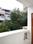 Sarvahit Apartments Attached Balcony with Bedroom One 3