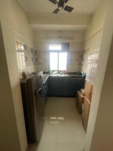 Kitchen Image of 550 Sq.ft 1 BHK Apartment / Flat for rent in Raunak Heights, Kasarvadavali Thane for Rs. 17000