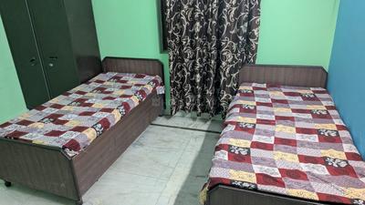 Bedroom Image of Roomsoom PG in Sector 56, Noida
