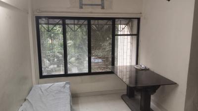 Living Room Image of 650 Sq.ft 2 BHK Apartment / Flat for sale in Unique Accord CHS, Mira Road East Mira Bhayandar for Rs. 8500000