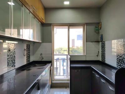 Kitchen Image of 600 Sq.ft 1 BHK Apartment / Flat for sale in VR Sukur Residency, Kasarvadavali Thane for Rs. 6300000
