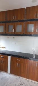 Kitchen Image of 1300 Sq.ft 3 BHK Builder Floor for rent in Beta II Greater Noida for Rs. 28000