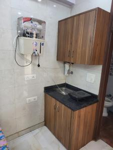 Kitchen Image of 320 Sq.ft 1 RK Builder Floor for rent in Karol Bagh New Delhi for Rs. 13092