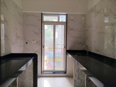 Kitchen Image of 596 Sq.ft 1 BHK Apartment / Flat for sale in Ashtha Pushp, Andheri East Mumbai for Rs. 13700000