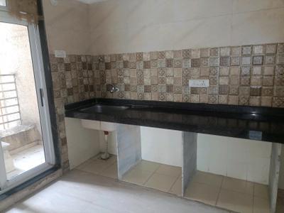 Kitchen Image of 877 Sq.ft 2 BHK Apartment / Flat for sale in Codename Upvan, Kharghar Navi Mumbai for Rs. 7500000