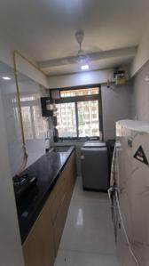 Kitchen Image of 1000 Sq.ft 2 BHK Apartment / Flat for rent in Piramal Aranya, Byculla Mumbai for Rs. 140045
