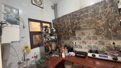 Kitchen Image of 700 Sq.ft 1 BHK Builder Floor for rent in Sector 57 Gurgaon for Rs. 24000