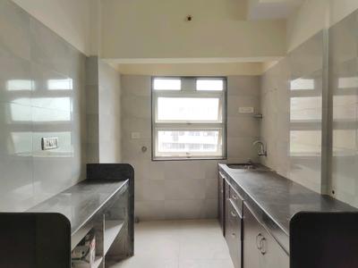 Kitchen Image of 1000 Sq.ft 2 BHK Apartment / Flat for sale in Rajendra Dolphin Tower, Malad West Mumbai for Rs. 14500000