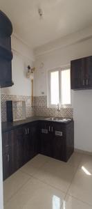 Kitchen Image of 650 Sq.ft 2 BHK Apartment / Flat for rent in Urbanrise Revolution One, Padur Chennai for Rs. 20500