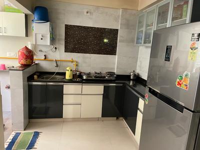 Kitchen Image of 850 Sq.ft 2 BHK Apartment / Flat for rent in Ayushyaman Elegance, Ghatlodiya Ahmedabad for Rs. 25000
