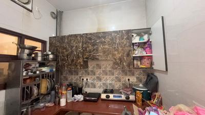 Kitchen Image of 700 Sq.ft 1 BHK Builder Floor for rent in Sector 57 Gurgaon for Rs. 24000