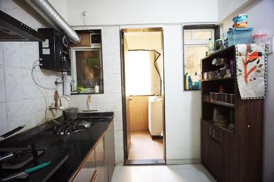 Kitchen Image of 1066 Sq.ft 2 BHK Apartment / Flat for sale in Ravinanda Trinity, Wagholi Pune for Rs. 7800000