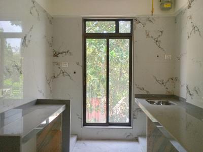 Kitchen Image of 847 Sq.ft 2 BHK Apartment / Flat for sale in Aastha Omkar, Titwala Thane for Rs. 3500000