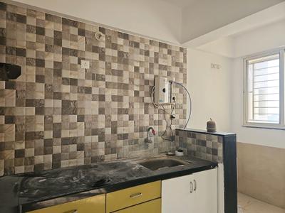 Kitchen Image of 611 Sq.ft 1 BHK Apartment / Flat for rent in Wadgaon Sheri Pune for Rs. 26000