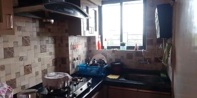 Kitchen Image of 877 Sq.ft 2 BHK Apartment / Flat for sale in Jai Balaji Krishna Kanha Appartment, Tollygunge Kolkata for Rs. 8500000