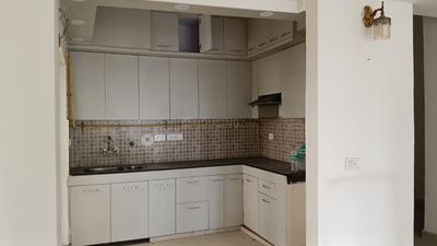Kitchen Image of 1553 Sq.ft 3 BHK Apartment / Flat for sale in Nimbus The Golden Palms, Sector 168 Noida for Rs. 18700000