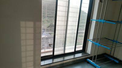 Living Room Image of 600 Sq.ft 1 BHK Apartment / Flat for sale in Mantra Montana, Dhanori Pune for Rs. 5200000