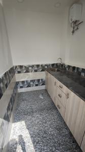 Kitchen Image of 450 Sq.ft 1 RK Builder Floor for rent in Sector 122 Noida for Rs. 20000