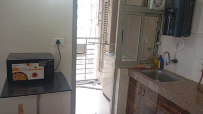 Kitchen Image of 1350 Sq.ft 2.5 BHK Apartment / Flat for rent in Adani The Meadows, Shantigram Ahmedabad for Rs. 36000
