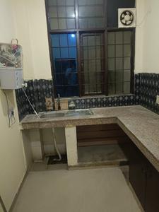 Kitchen Image of 1200 Sq.ft 2 BHK Builder Floor for rent in Palam Vihar Gurgaon for Rs. 27000