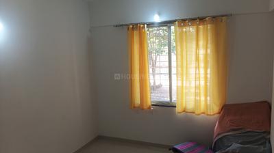 Bedroom Image of 650 Sq.ft 2 BHK Apartment / Flat for rent in Charholi Budruk Pune for Rs. 16000