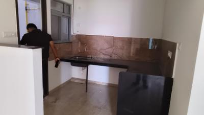 Kitchen Image of 950 Sq.ft 2 BHK Apartment / Flat for sale in Tathawade Pune for Rs. 9500000