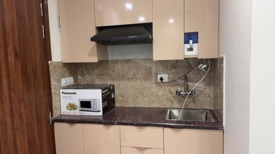 Kitchen Image of 1500 Sq.ft 1 BHK Builder Floor for rent in Sector 39 Gurgaon for Rs. 32000
