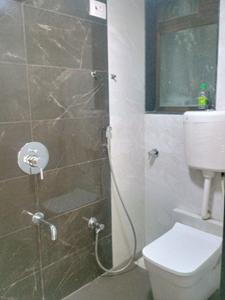 Common Bathroom Image of 833 Sq.ft 2 BHK Apartment / Flat for sale in Akshar Ashlar Tattva, Titwala Thane for Rs. 4500000